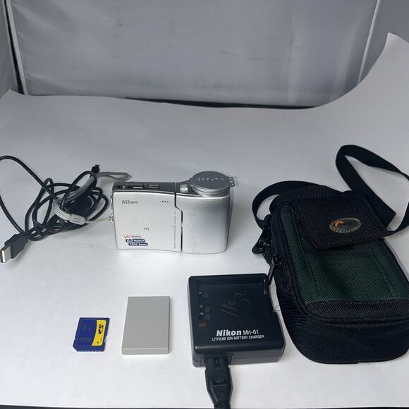 NIKON COOLPIX S10 VR Digital Camera, Case, New Battery -Charger, 1 GB Card WORKS - Picture 1 of 9